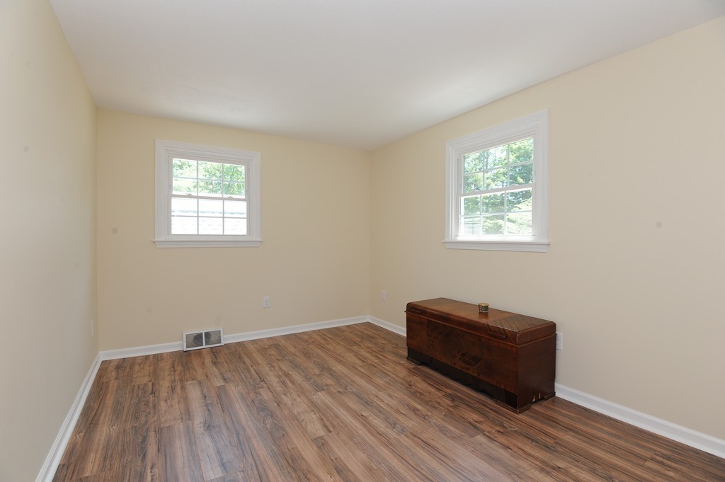 41 Chapel Road Amherst, MA 01002 - Photo 21 of 30 a view of a room with wooden floor and windows