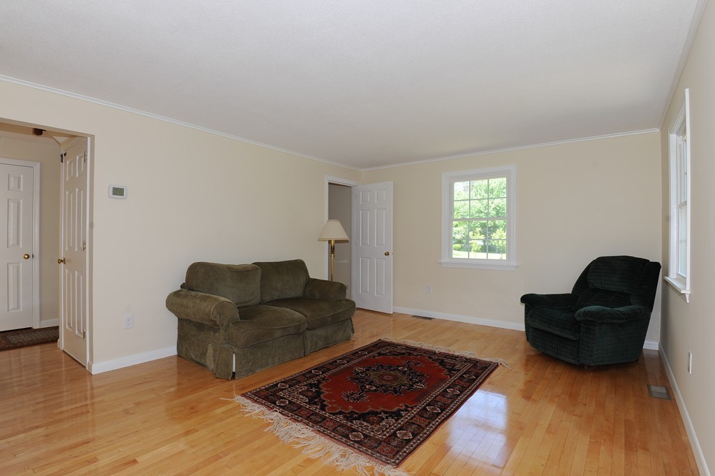 41 Chapel Road Amherst, MA 01002 - Photo 3 of 30 a living room with furniture and a rug
