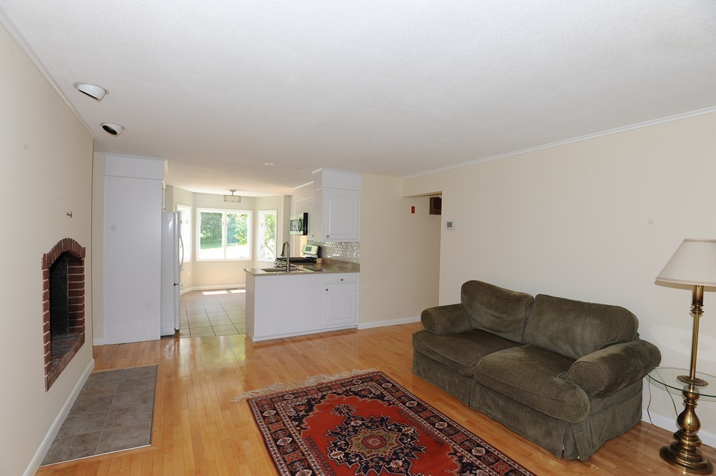 41 Chapel Road Amherst, MA 01002 - Photo 5 of 30 a living room with furniture and a rug