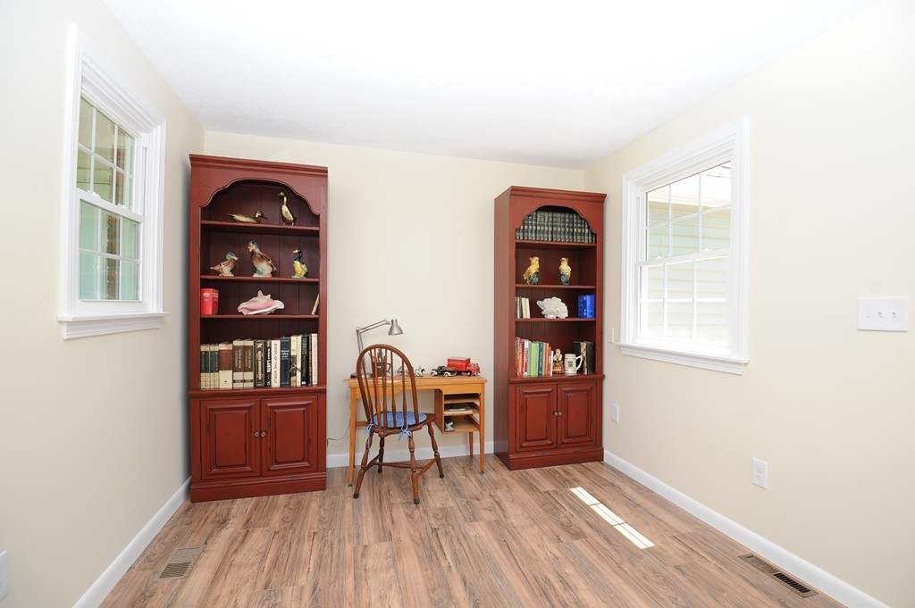 41 Chapel Road Amherst, MA 01002 - Photo 8 of 30 a view of a livingroom with furniture and wooden floor