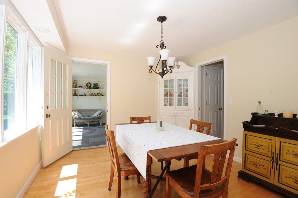 41 Chapel Road Amherst, MA 01002 - Photo 9 of 30 a view of a dining room with furniture and wooden floor