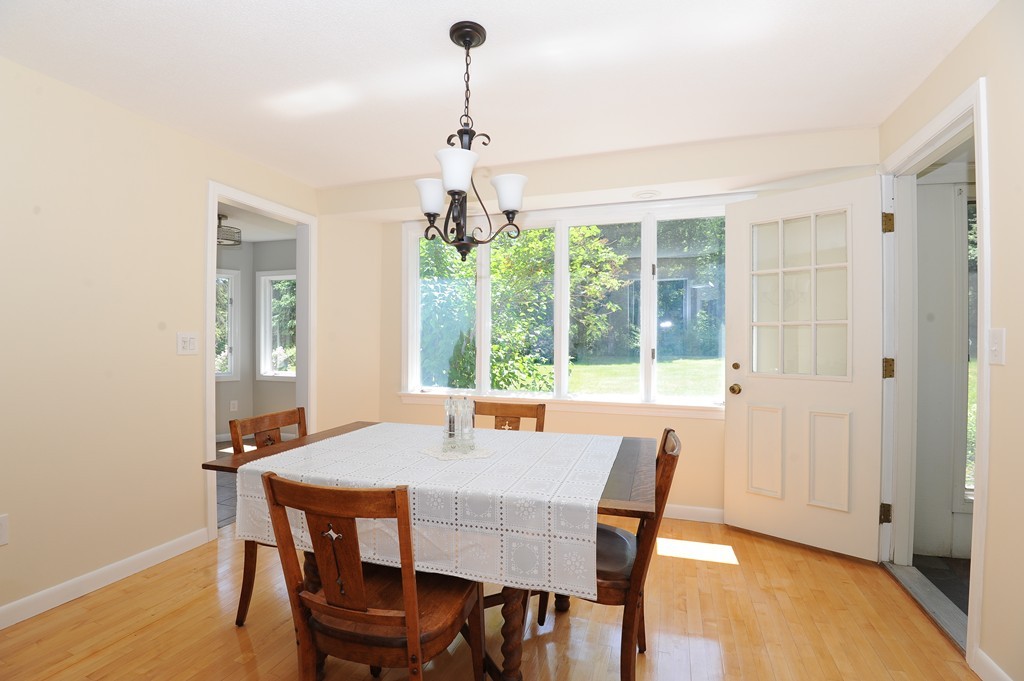 41 Chapel Road Amherst, MA 01002 - Photo 10 of 30 a view of a dining room with furniture window and outside view