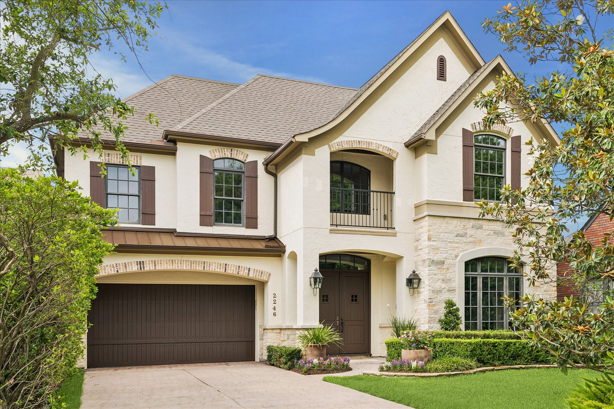 Beautifully refreshed Upper Kirby home with timeless architecture, manicured landscaping, and exceptional curb appeal.