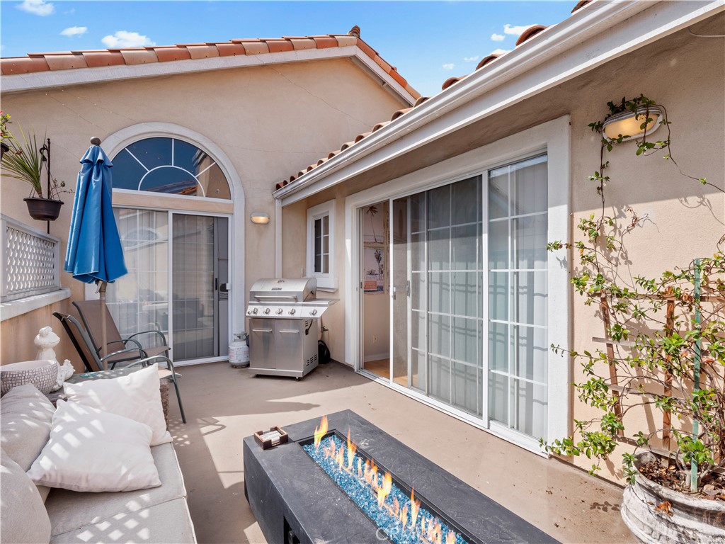 2517 Rockefeller Lane, Unit B Redondo Beach, CA 90278 - Photo 16 of 36 a front view of a house with outdoor seating