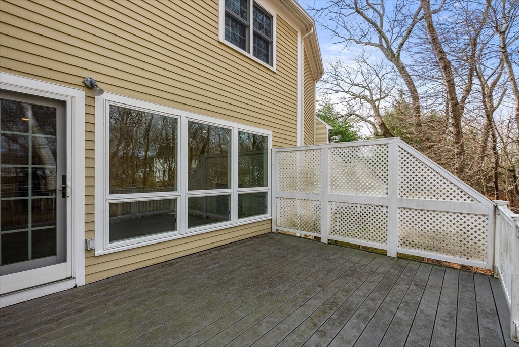 3 Parker Ridge Way, Unit 3 Newburyport, MA 01950 - Photo 13 of 40 a view of a house with a large window and wooden floor