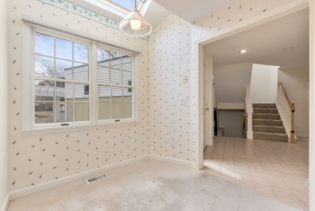 3 Parker Ridge Way, Unit 3 Newburyport, MA 01950 - Photo 14 of 40 a view of a livingroom with a fireplace
