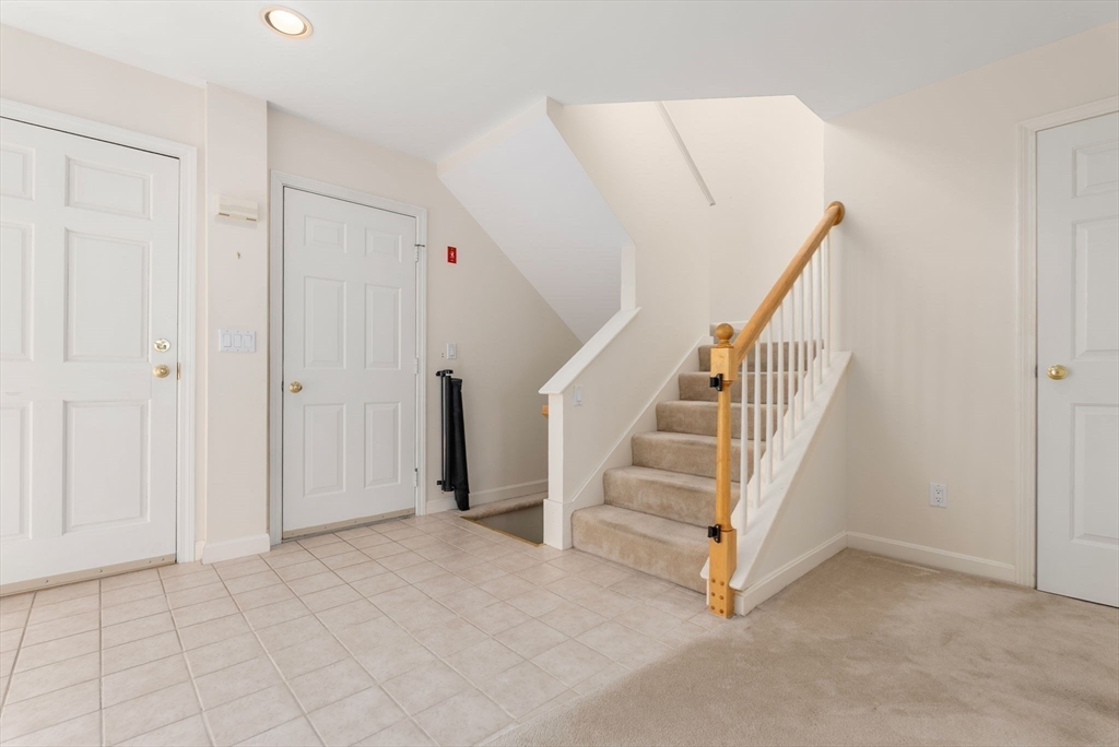 3 Parker Ridge Way, Unit 3 Newburyport, MA 01950 - Photo 15 of 40 a view of a hallway with staircase