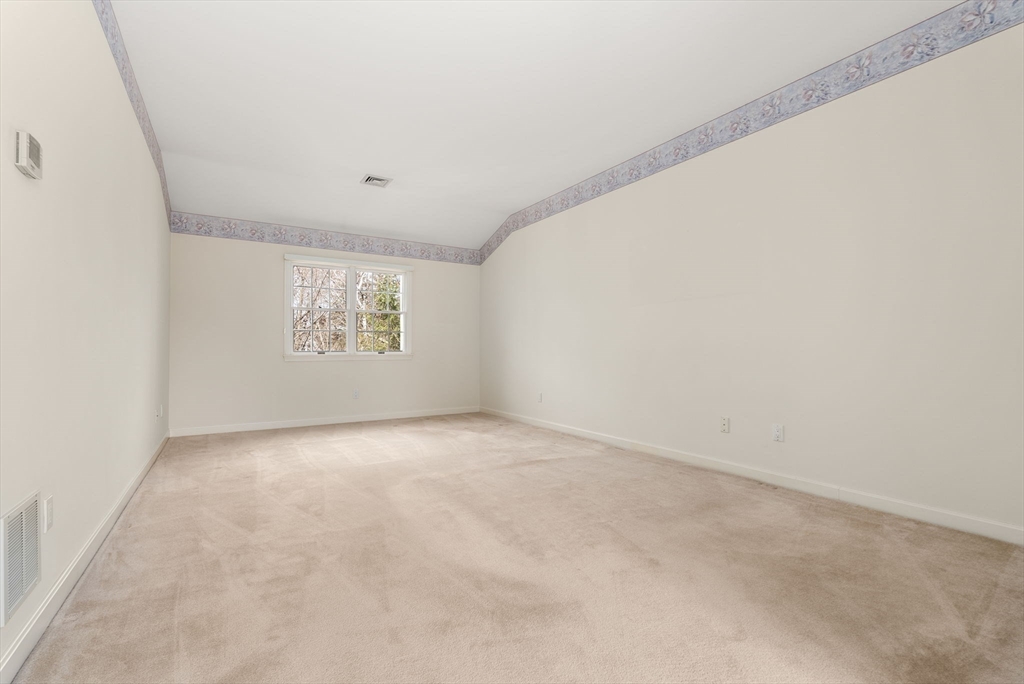 3 Parker Ridge Way, Unit 3 Newburyport, MA 01950 - Photo 17 of 40 a view of an empty room with a window