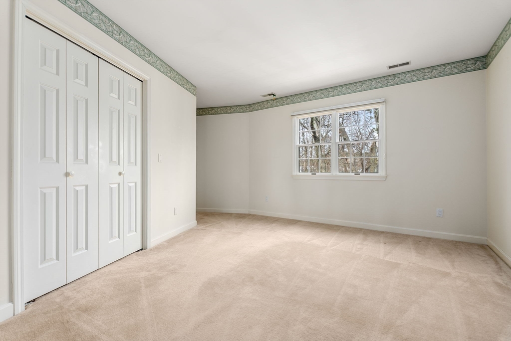 3 Parker Ridge Way, Unit 3 Newburyport, MA 01950 - Photo 20 of 40 an empty room with windows