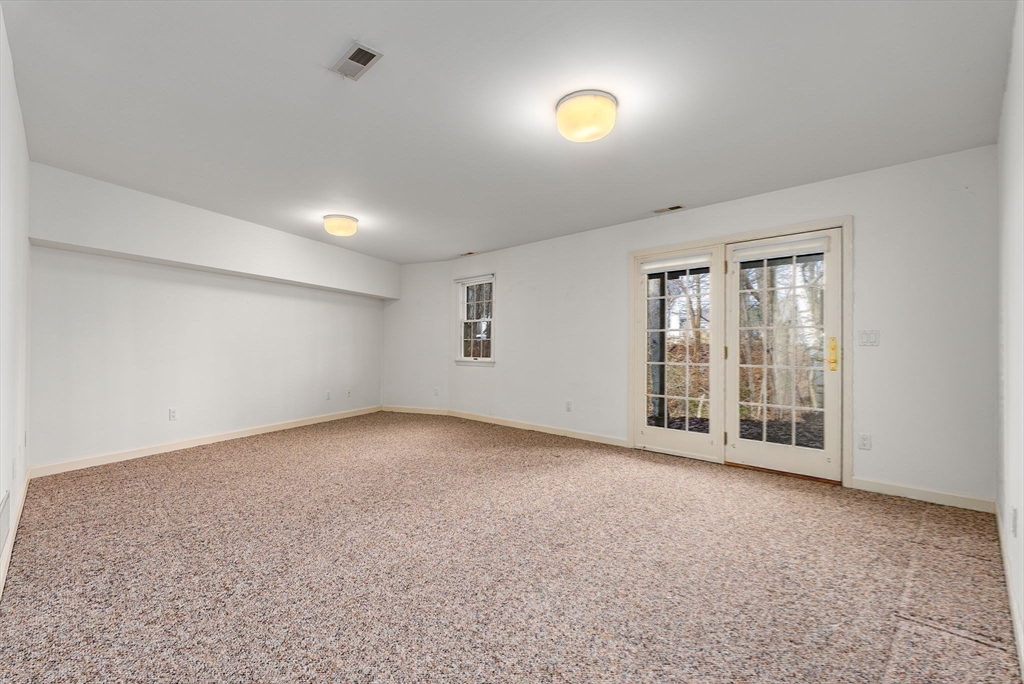 3 Parker Ridge Way, Unit 3 Newburyport, MA 01950 - Photo 25 of 40 an empty room with windows and entrance