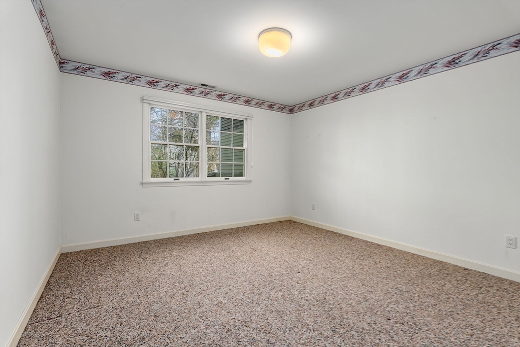 3 Parker Ridge Way, Unit 3 Newburyport, MA 01950 - Photo 27 of 40 an empty room with a empty space and windows