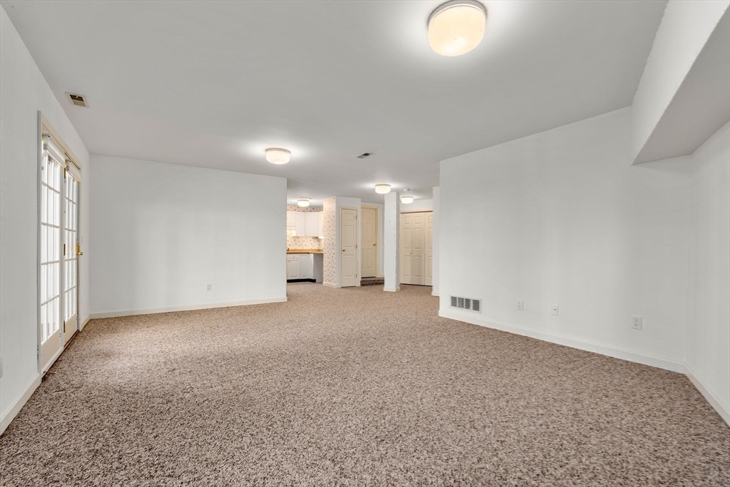 3 Parker Ridge Way, Unit 3 Newburyport, MA 01950 - Photo 28 of 40 an empty room with a natural light