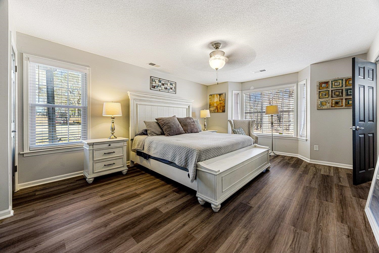 401 North Sanga Road Memphis, TN 38018 - Photo 14 of 27 Bedroom featuring dark wood finished floors, a textured ceiling, and a ceiling fan