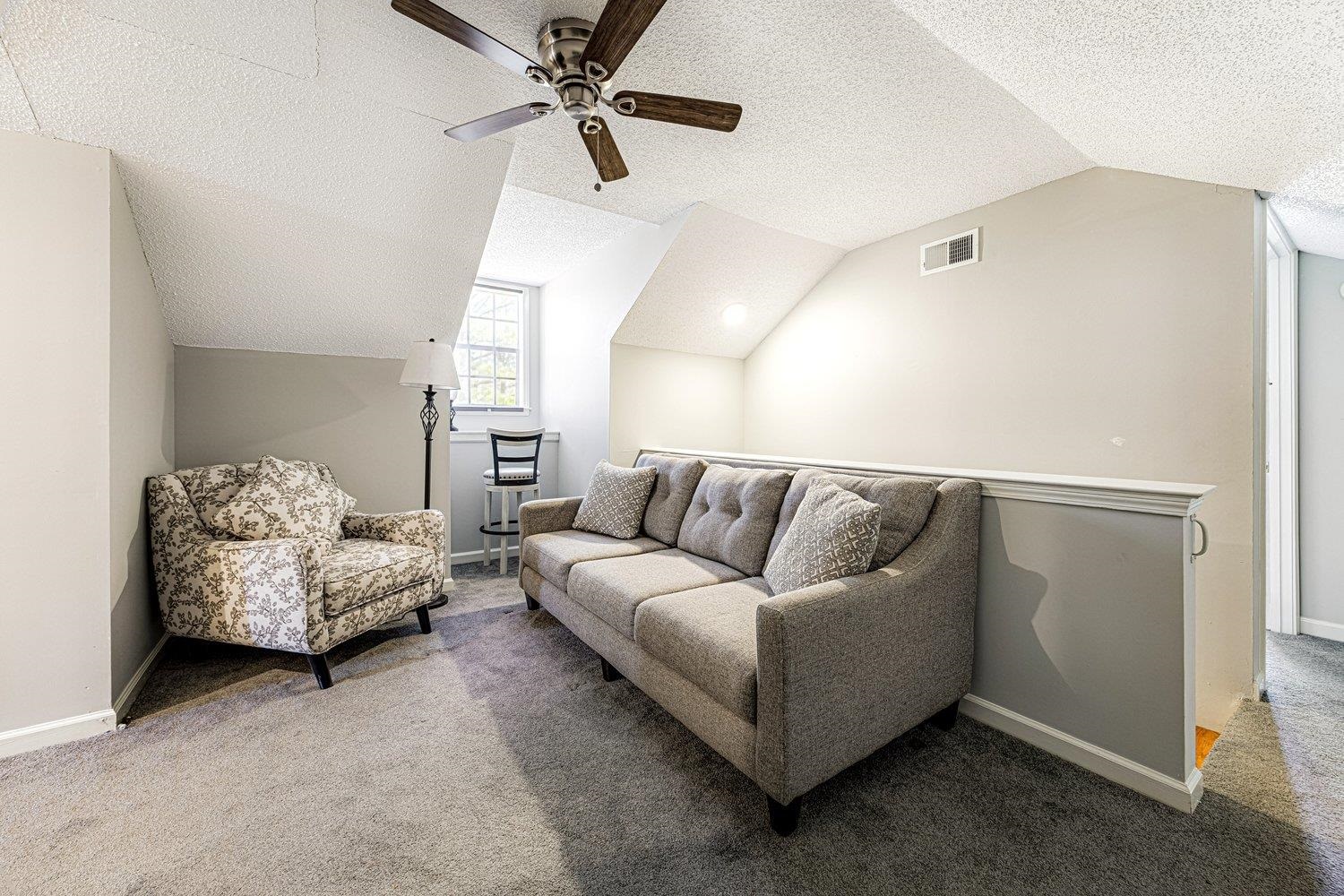 401 North Sanga Road Memphis, TN 38018 - Photo 17 of 27 Carpeted living room featuring baseboards and ceiling fan
