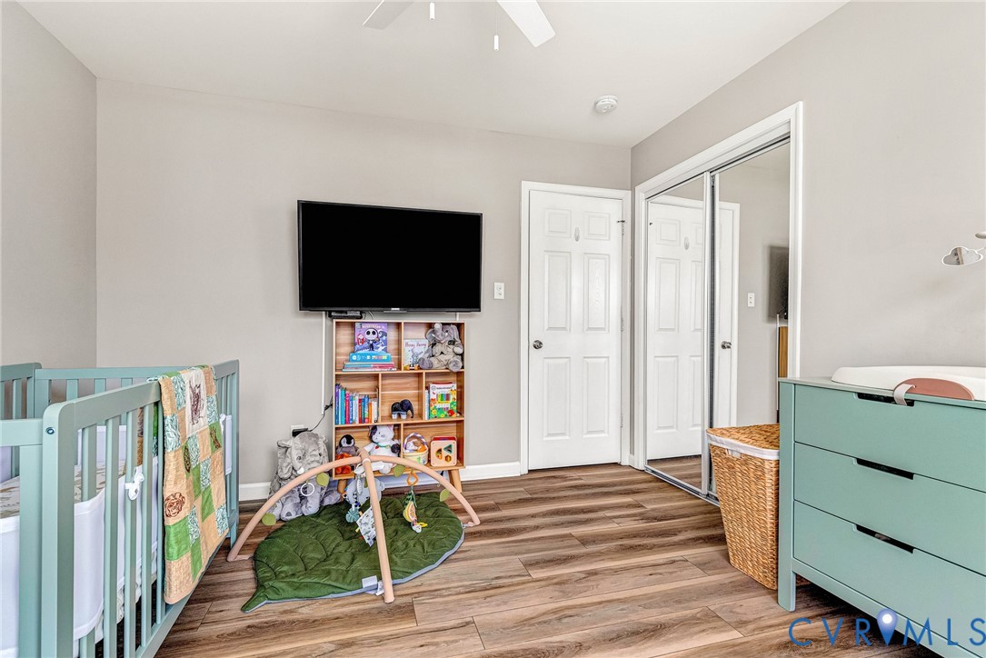 2702 Amherst Ridge Loop Colonial Heights, VA 23834 - Photo 28 of 38 a view of a livingroom with furniture and a flat screen tv