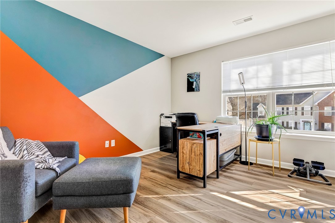 2702 Amherst Ridge Loop Colonial Heights, VA 23834 - Photo 31 of 38 a living room with furniture and a table