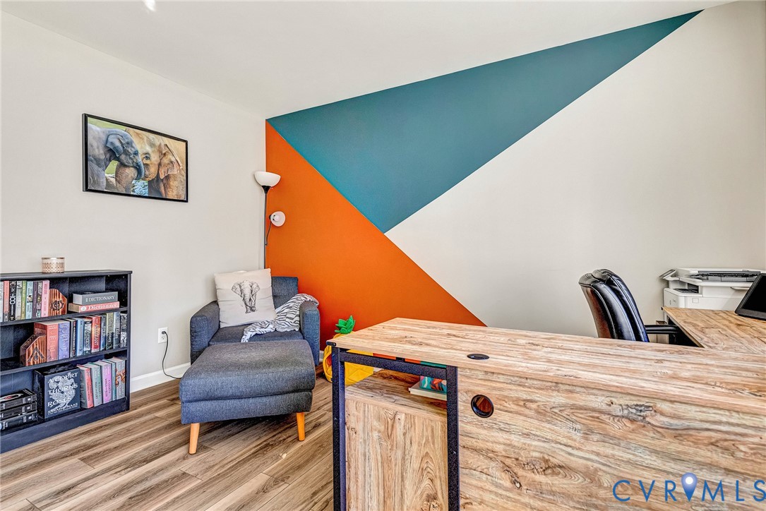 2702 Amherst Ridge Loop Colonial Heights, VA 23834 - Photo 32 of 38 a view of living room with furniture and book shelf