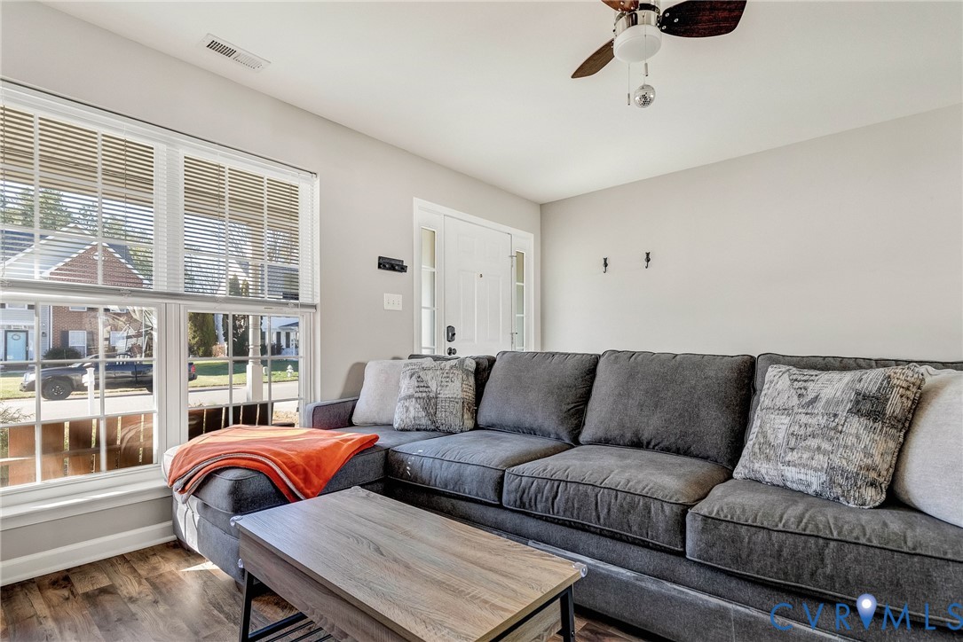2702 Amherst Ridge Loop Colonial Heights, VA 23834 - Photo 8 of 38 a living room with furniture and a large window