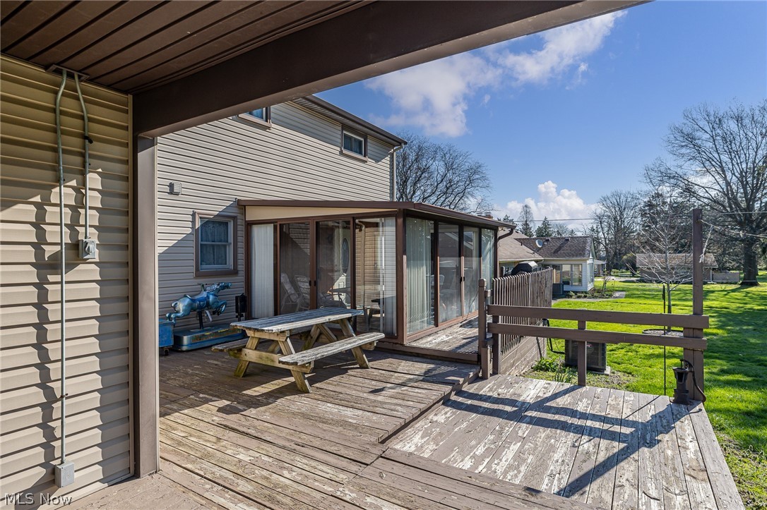 490 Mapleview Drive Seven Hills, OH 44131 - Photo 41 of 50 Deck with a sunroom
