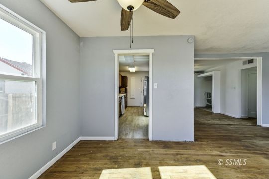 329 North Balsam Street Ridgecrest, CA 93555 - Photo 7 of 27 a view of an entryway of house and wooden floor