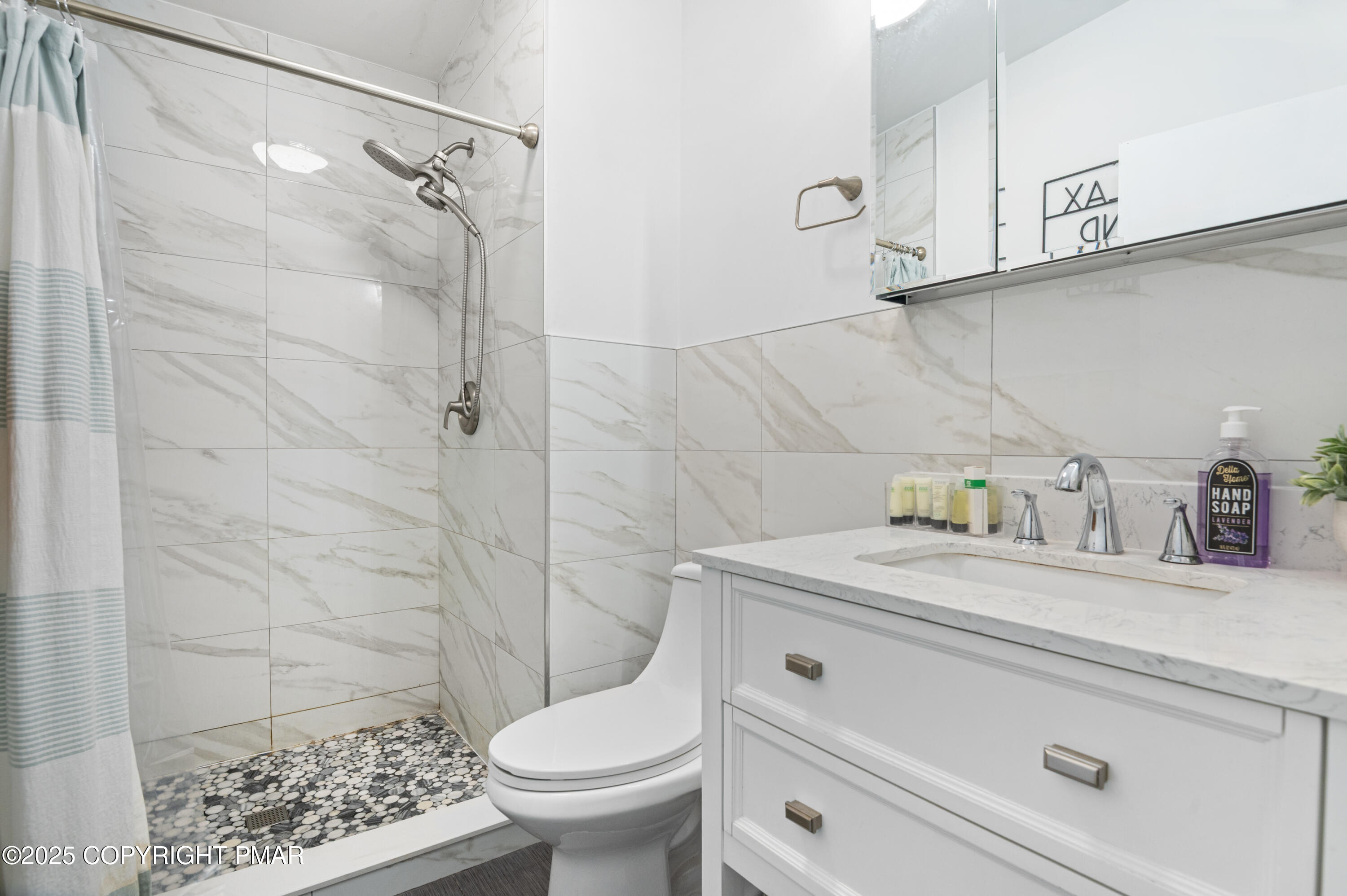 624 Westlake Drive East Stroudsburg, PA 18302 - Photo 113 of 115 a bathroom with a granite countertop sink a toilet and shower