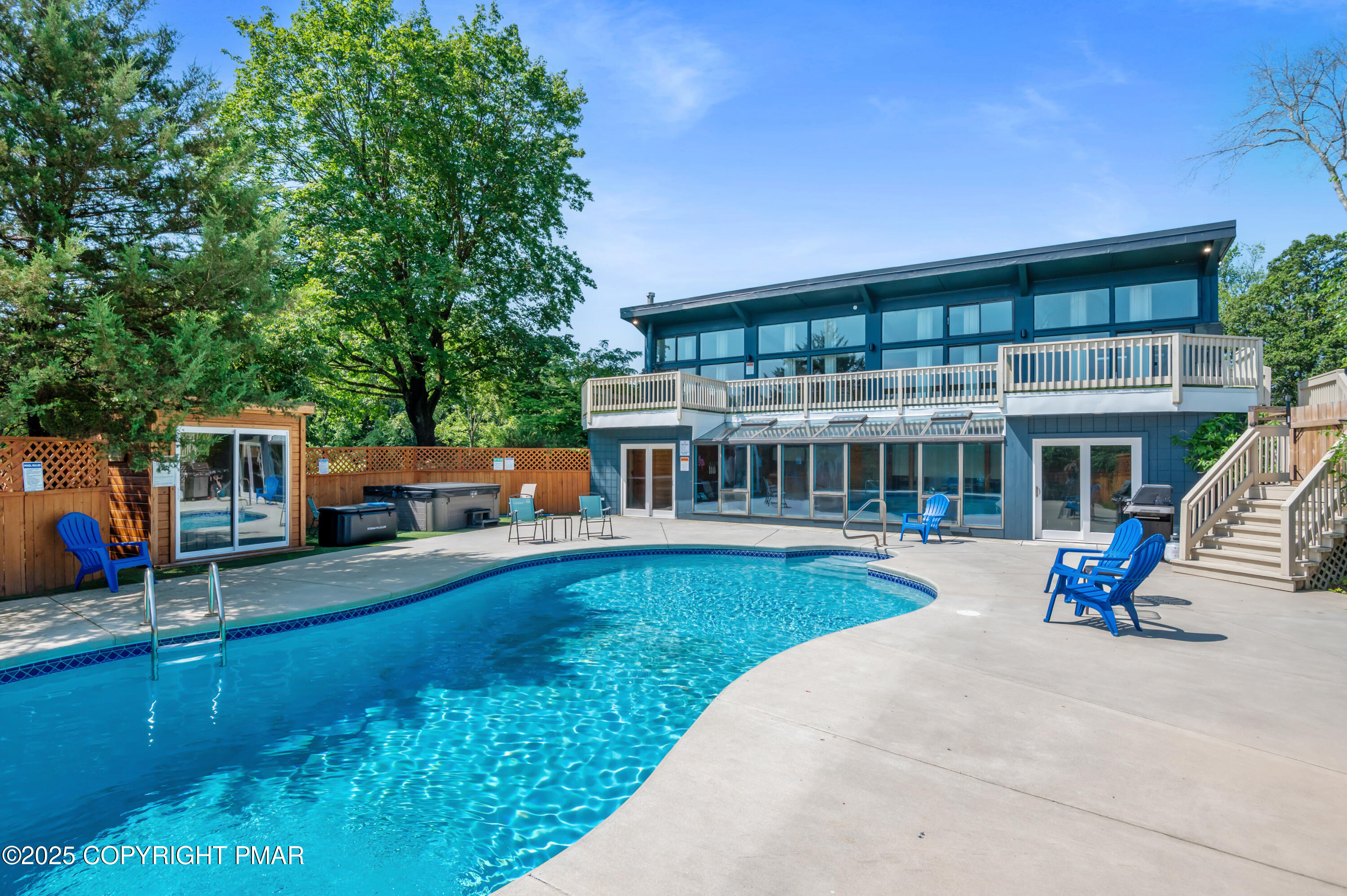 624 Westlake Drive East Stroudsburg, PA 18302 - Photo 15 of 115 swimming pool view with a seating space and a garden view