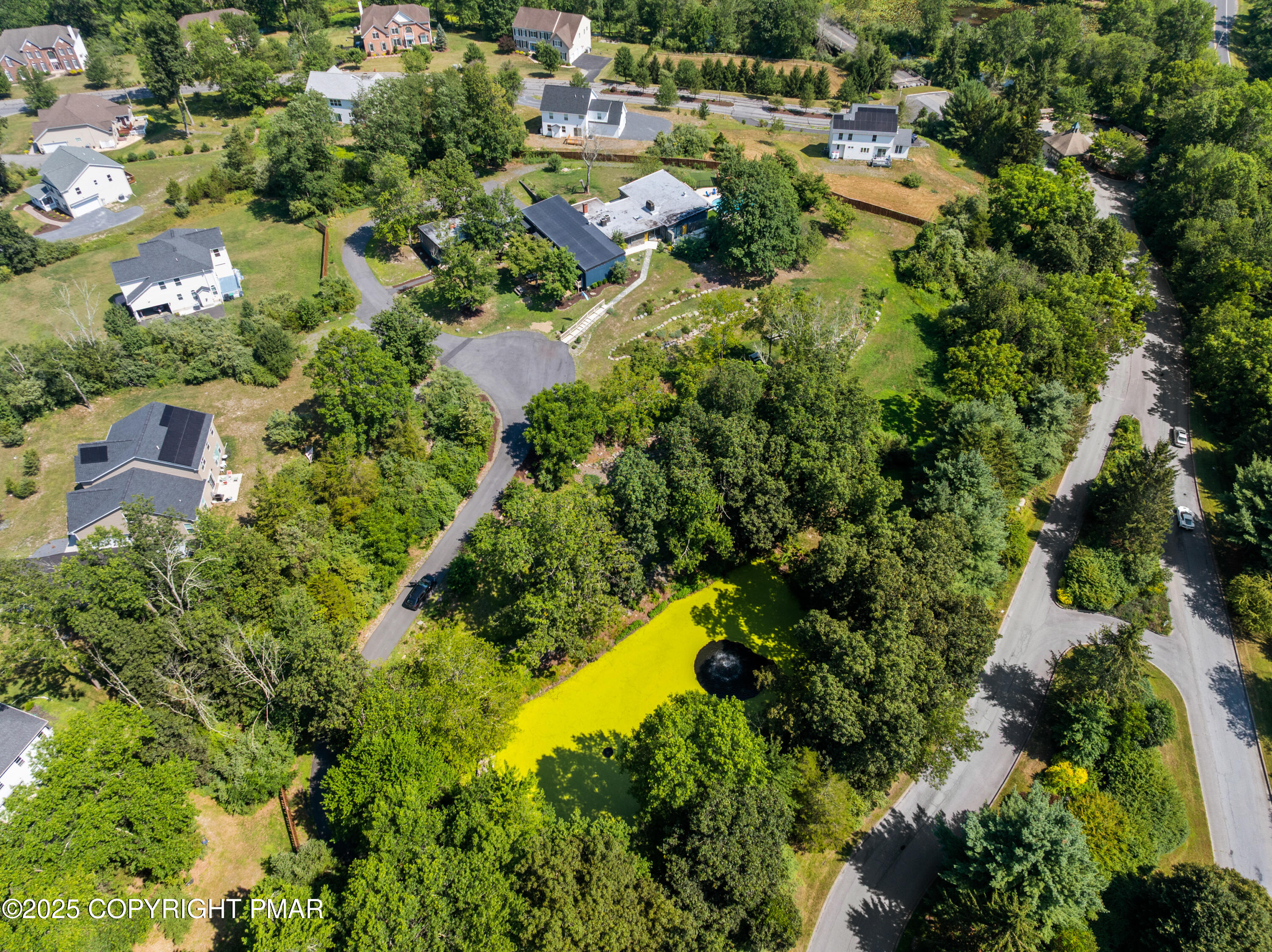 624 Westlake Drive East Stroudsburg, PA 18302 - Photo 25 of 115 an aerial view of residential house with outdoor space and trees all around
