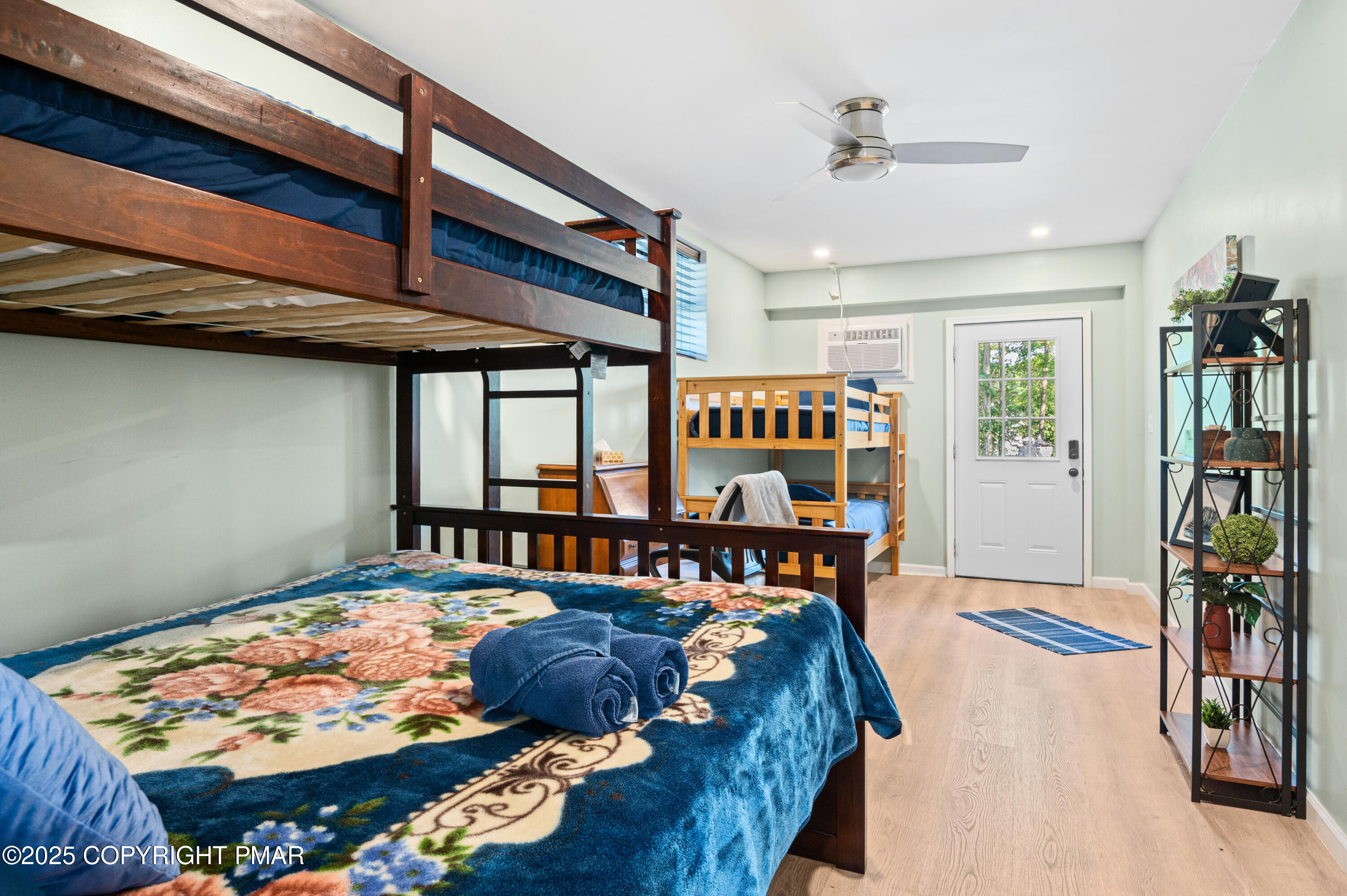 624 Westlake Drive East Stroudsburg, PA 18302 - Photo 34 of 115 a bed room with a bed and a book shelf