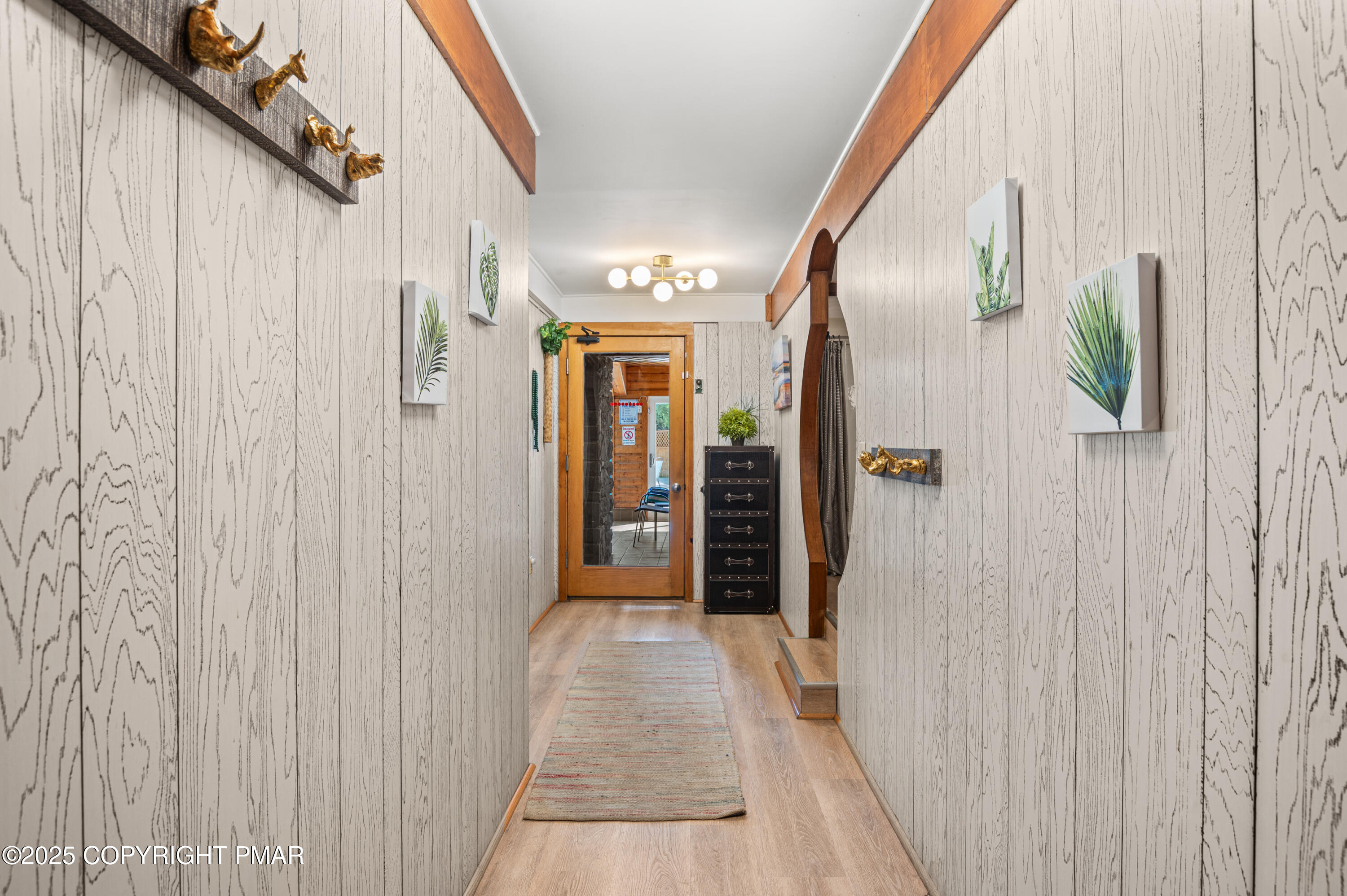 624 Westlake Drive East Stroudsburg, PA 18302 - Photo 48 of 115 a view of a hallway with wooden floor and staircase