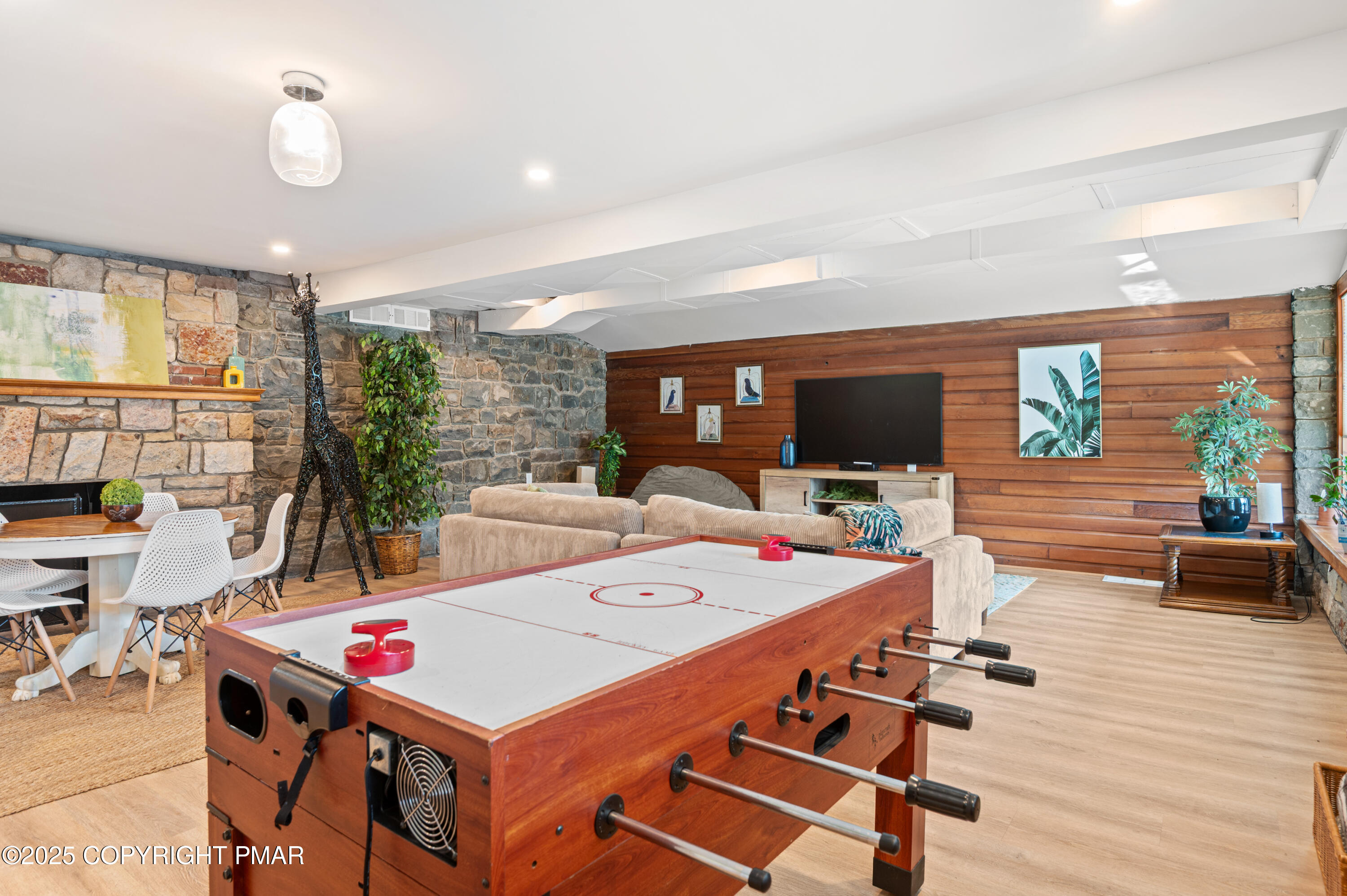 624 Westlake Drive East Stroudsburg, PA 18302 - Photo 52 of 115 a room with furniture and a flat screen tv