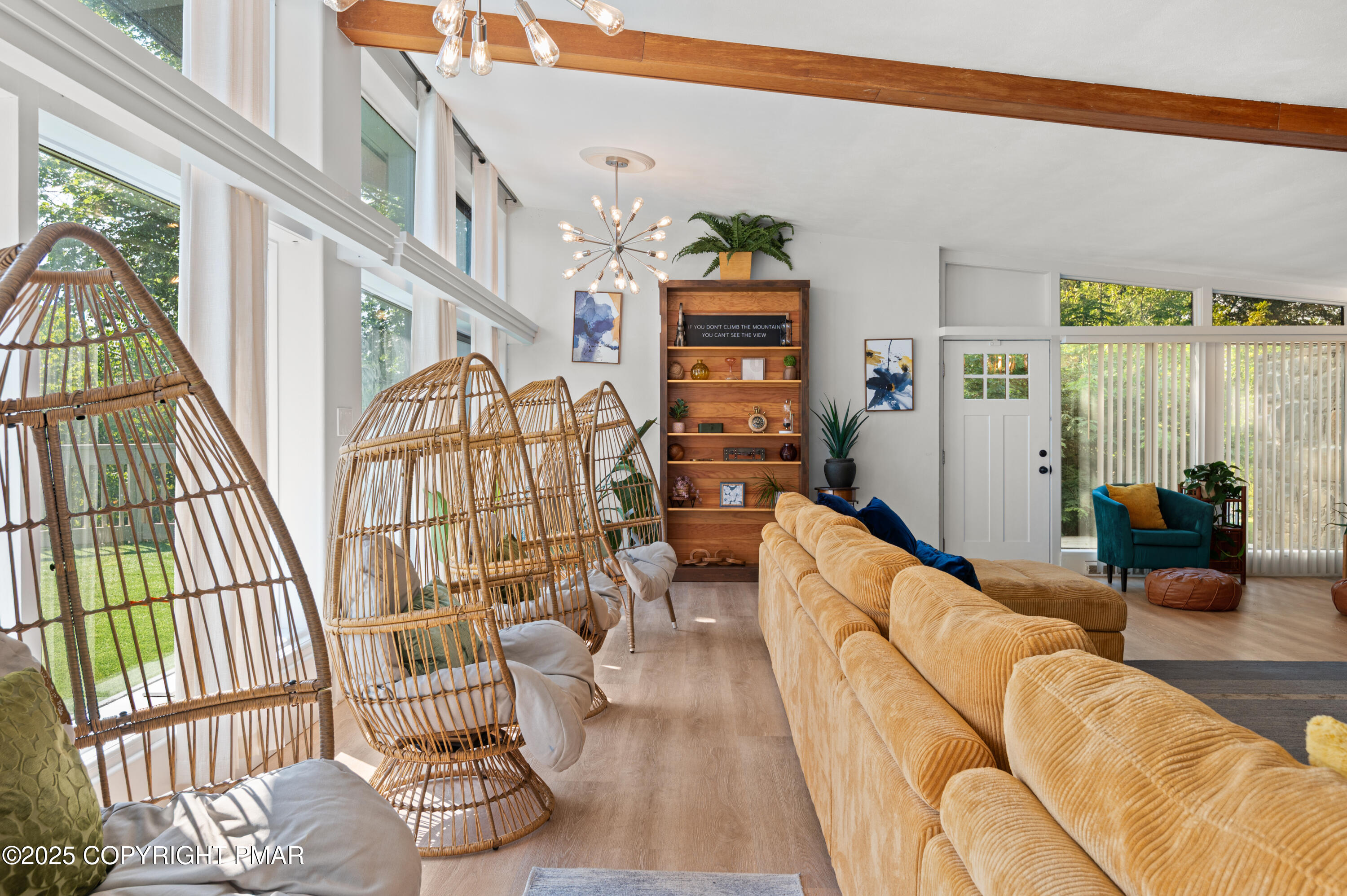 624 Westlake Drive East Stroudsburg, PA 18302 - Photo 67 of 115 a living room with furniture floor to ceiling window and floor to ceiling windows