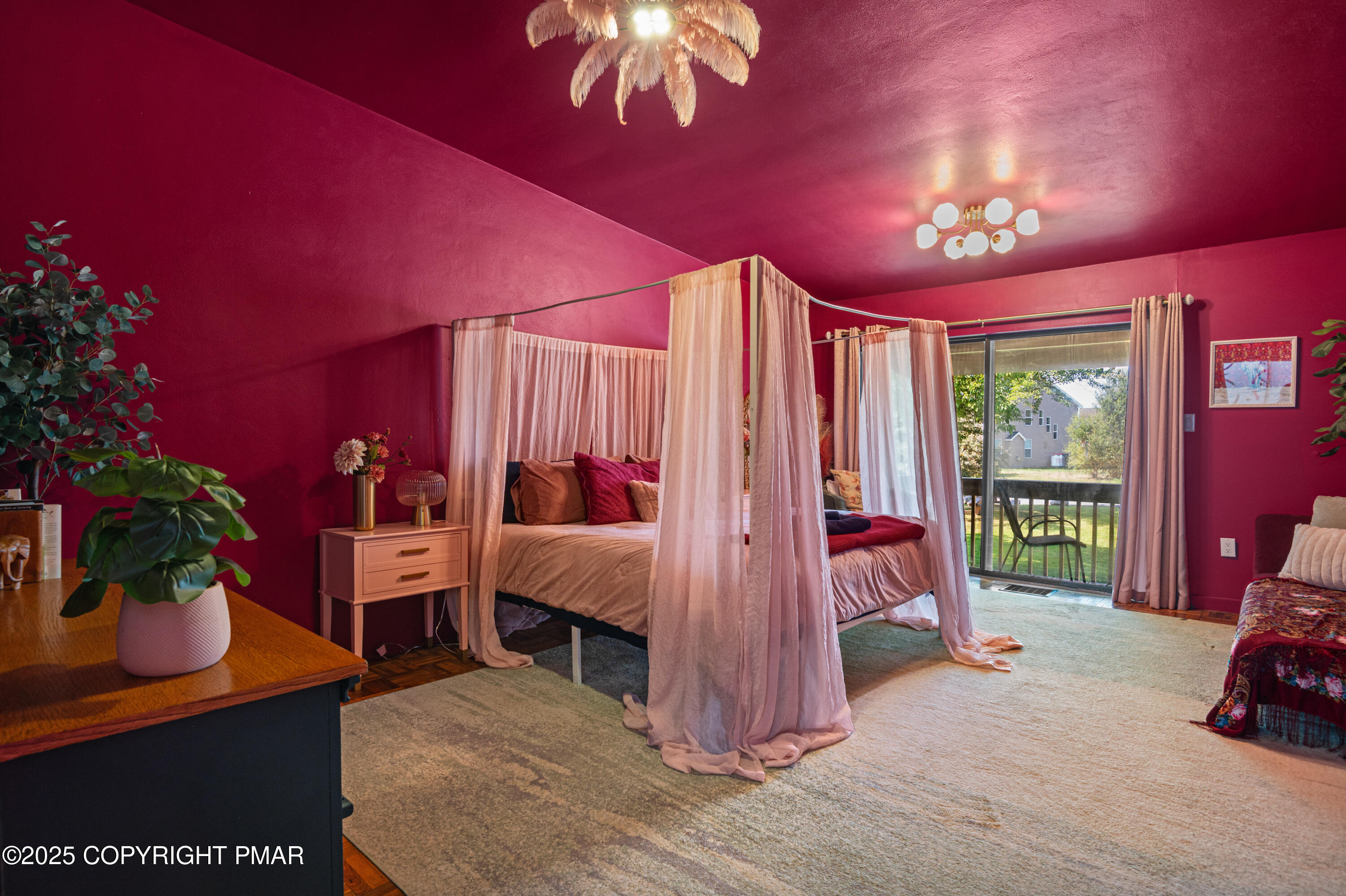 624 Westlake Drive East Stroudsburg, PA 18302 - Photo 90 of 115 a bed room with a bed and a chandelier