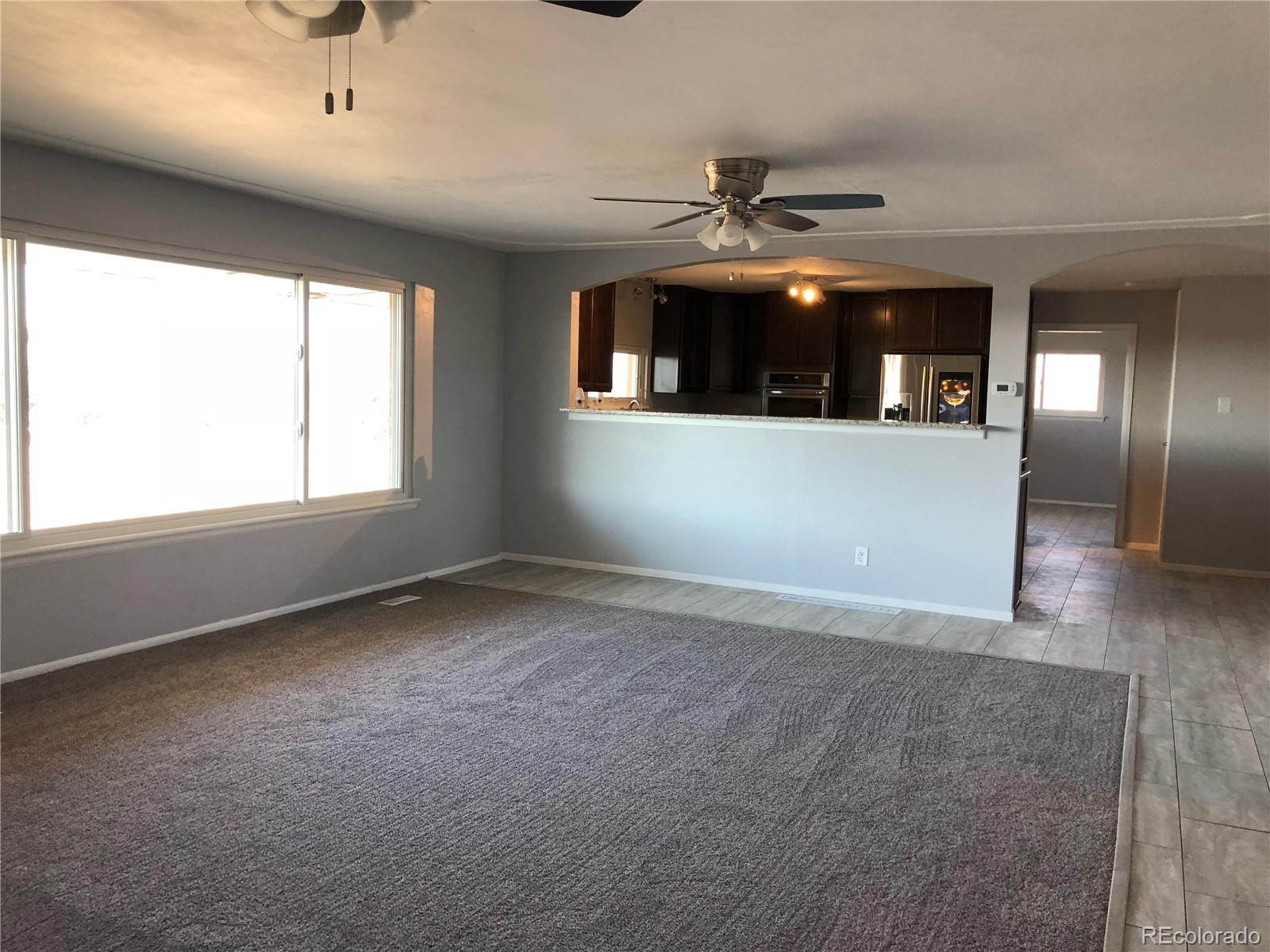 39592 County Road 18 Roggen, CO 80652 - Photo 12 of 34 a view of an empty room with a window