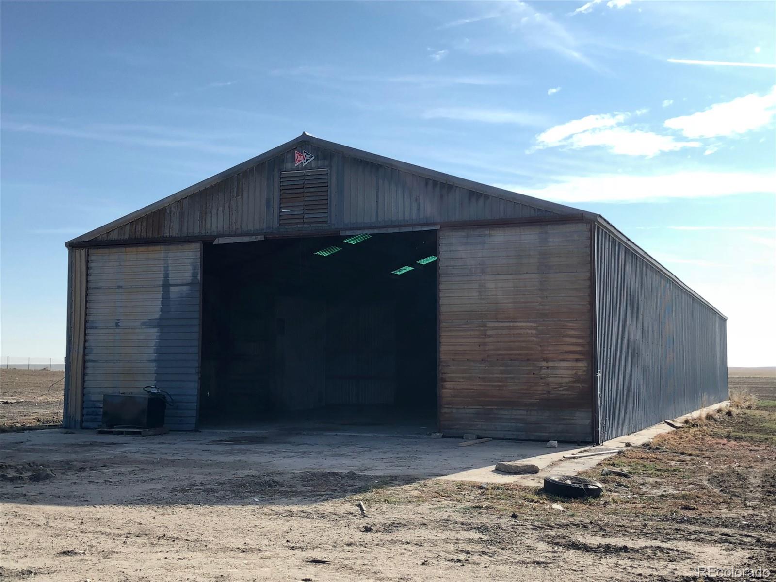 39592 County Road 18 Roggen, CO 80652 - Photo 29 of 34 a backyard of a house