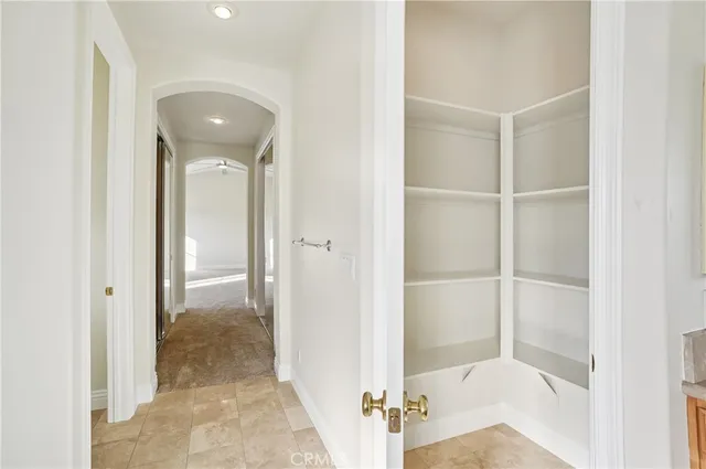 a bathroom with a sink double vanity and a mirror