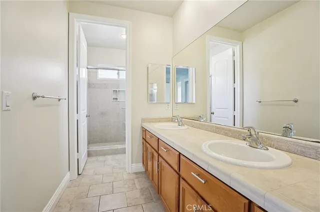 a bathroom with a toilet and shower