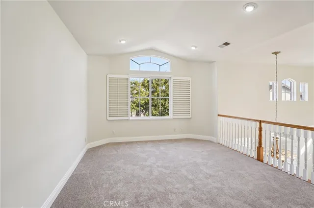 a bathroom with a shower sink vanity and mirror