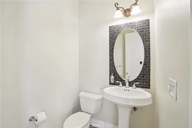 a outdoor living space with furniture and a potted plant