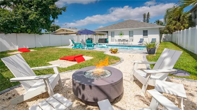 a view of a patio with swimming pool