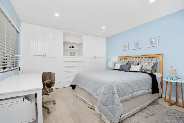 a view of living room with furniture and floor to ceiling window