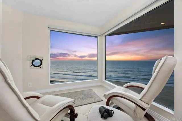 a view of a ocean with beach