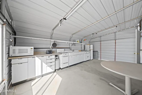 a utility room with cabinets