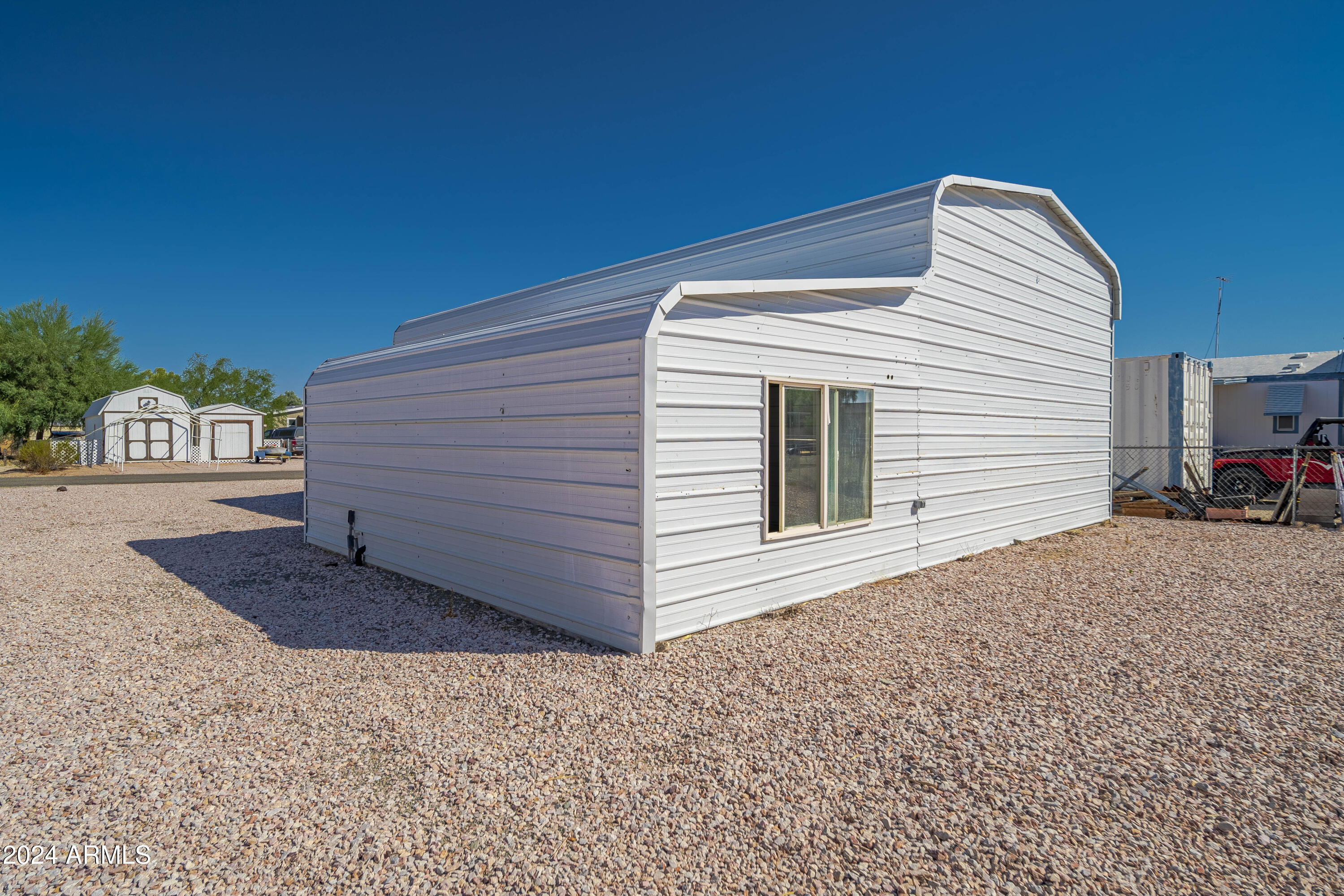 66934 Prose Lane Salome, AZ 85348 - Photo 16 of 30 a front view of a house with a garage
