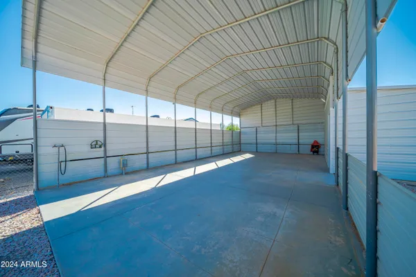 a view of a house with a yard and garage