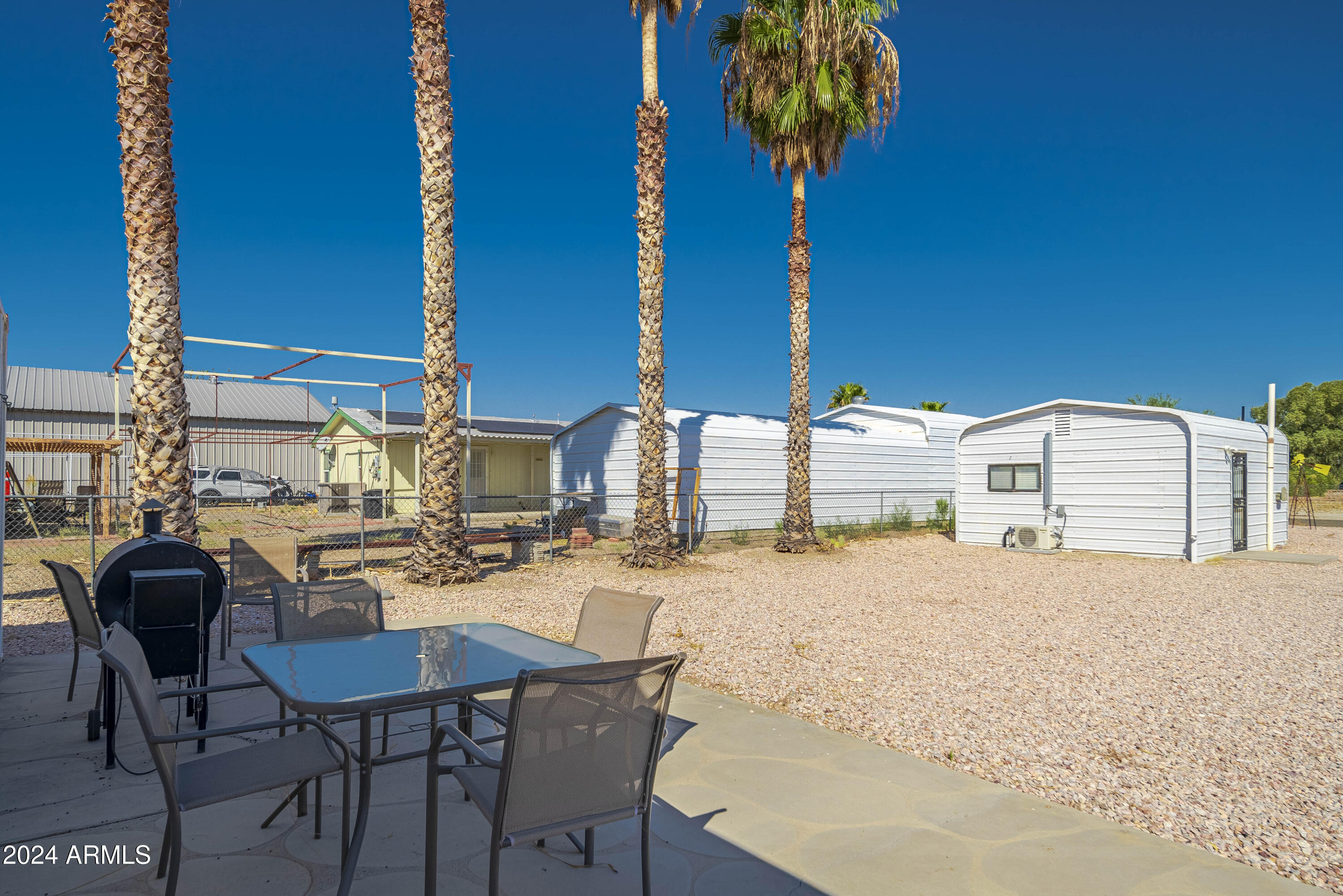 66934 Prose Lane Salome, AZ 85348 - Photo 2 of 30 a view of a chairs and table in the patio