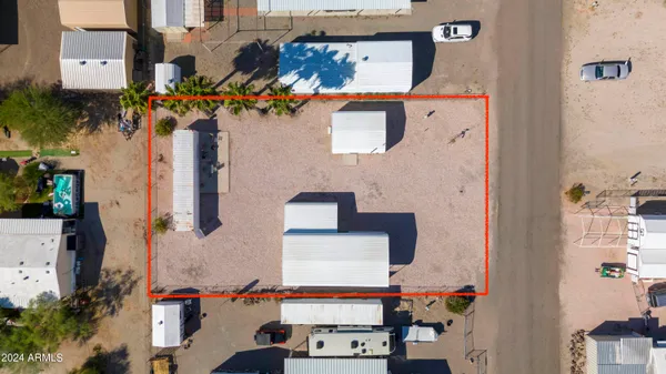 an aerial view of a house with outdoor space