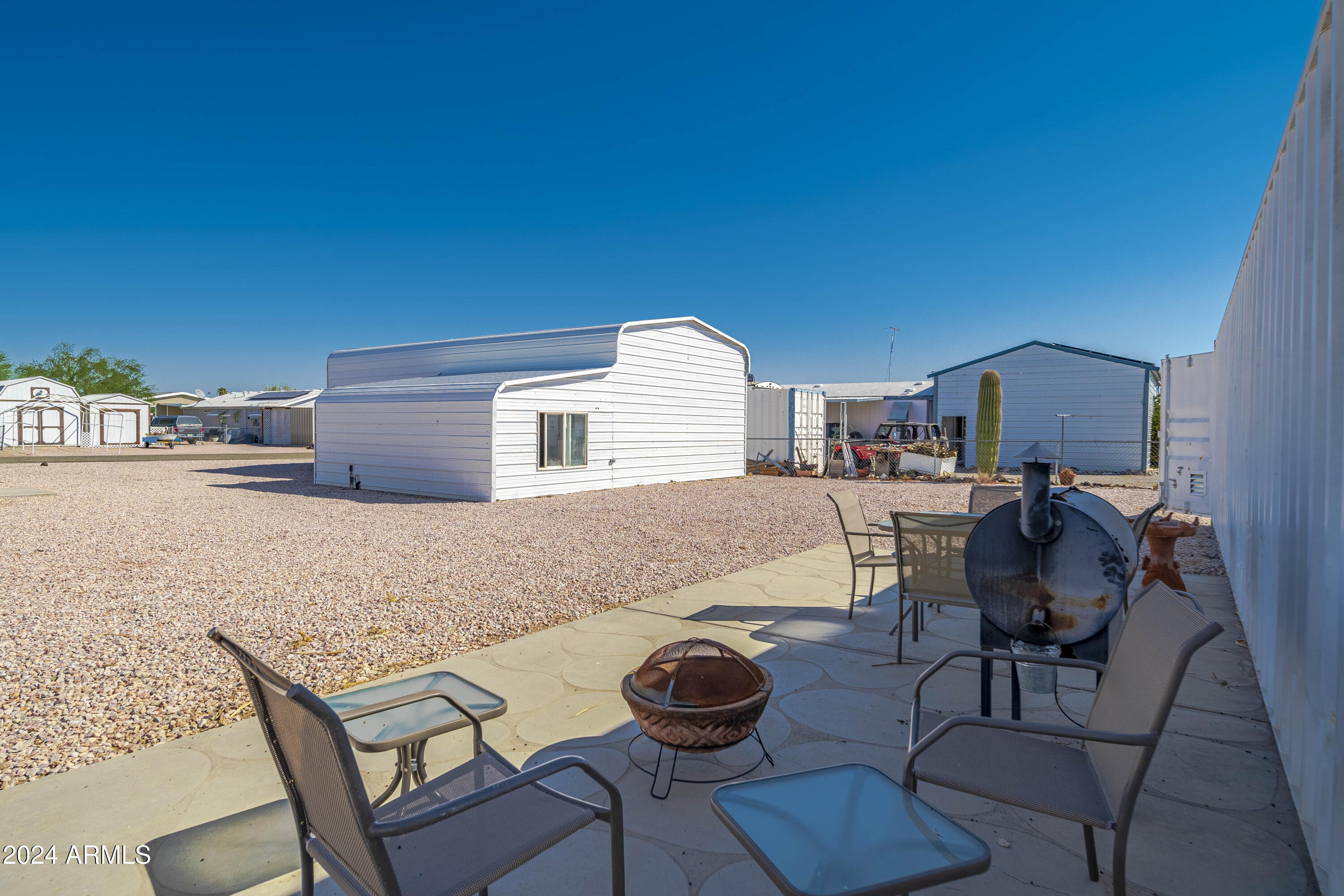 66934 Prose Lane Salome, AZ 85348 - Photo 3 of 30 a living room with furniture and a wooden floor