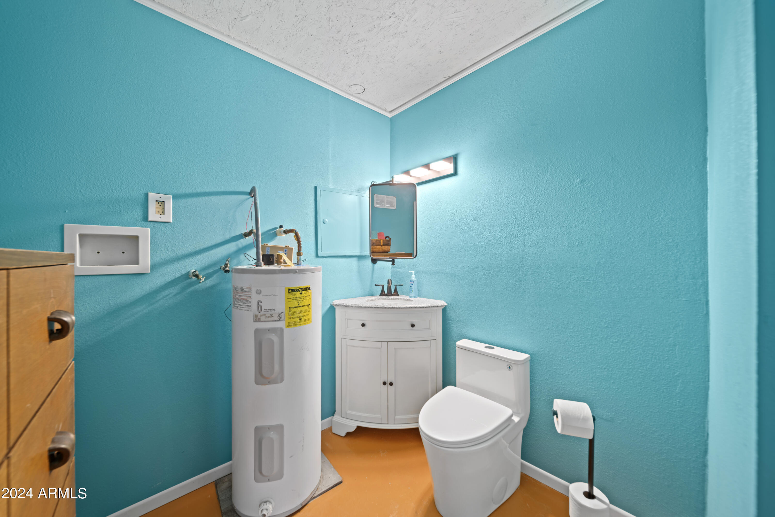 66934 Prose Lane Salome, AZ 85348 - Photo 9 of 30 a bathroom with a toilet and a sink