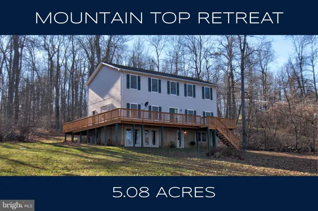 a view of a house with a swimming pool