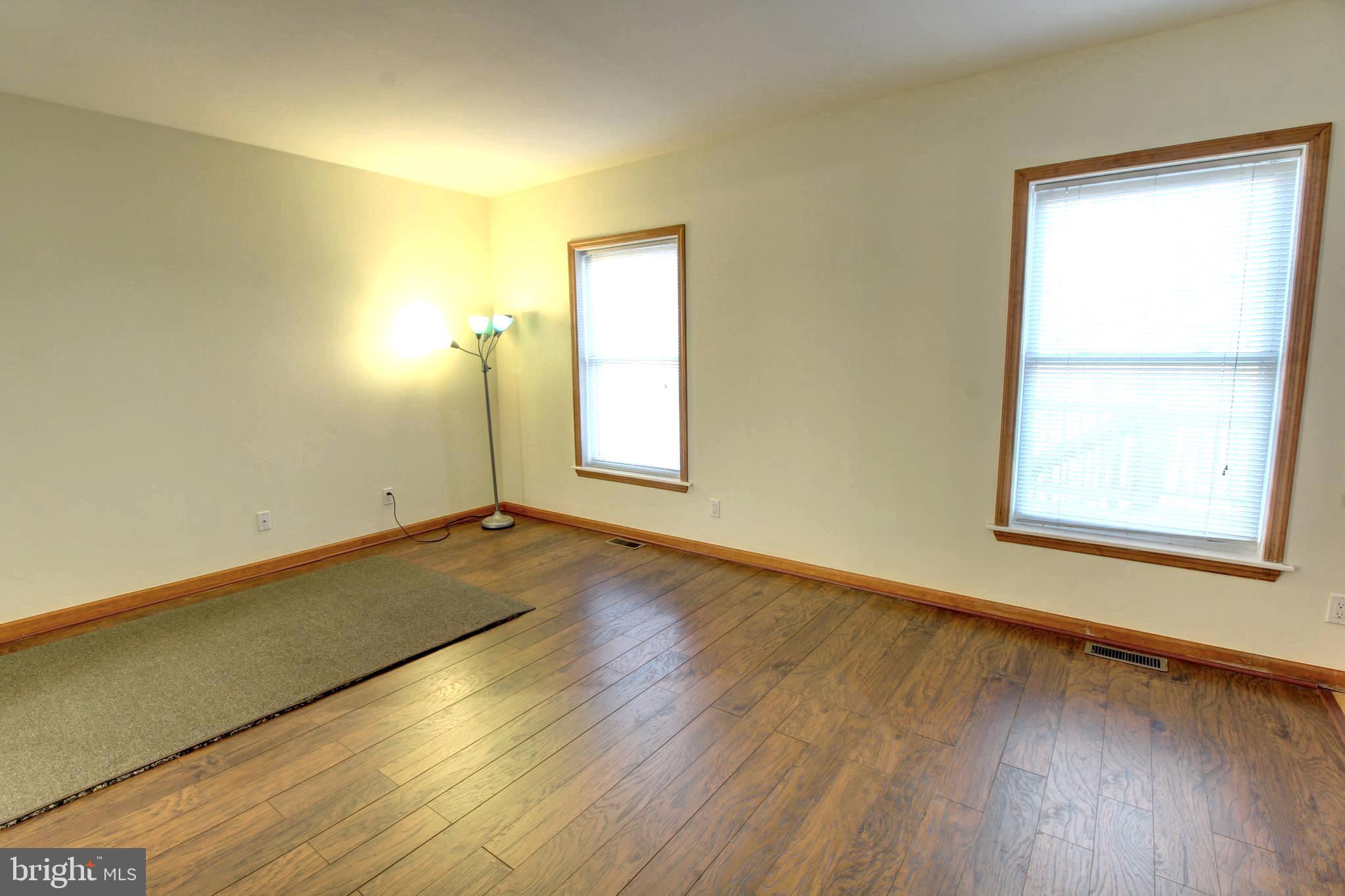 745 Fire Trail Road Front Royal, VA 22630 - Photo 17 of 58 a view of a room with wooden floor and window